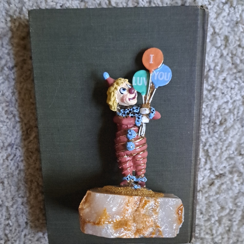 Colorful Clown Figurine with Balloons